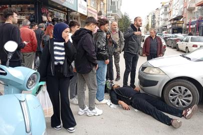 Otomobille çarpışan motosiklet sürücüsü yaralandı