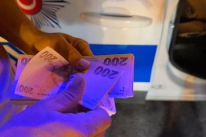 Bursa'da aracın üzerinde bulduğu çantadaki 30 bin TL'yi polise teslim etti