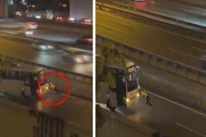 Görüntüler İstanbul'dan! Kadın polis arızalanan midibüsü böyle itti